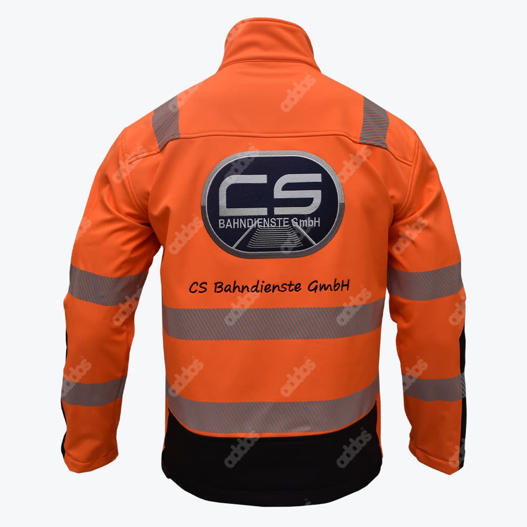 Back view of a bright orange high-visibility safety jacket with reflective stripes and the CS Bahndienste GmbH logo printed on the back.