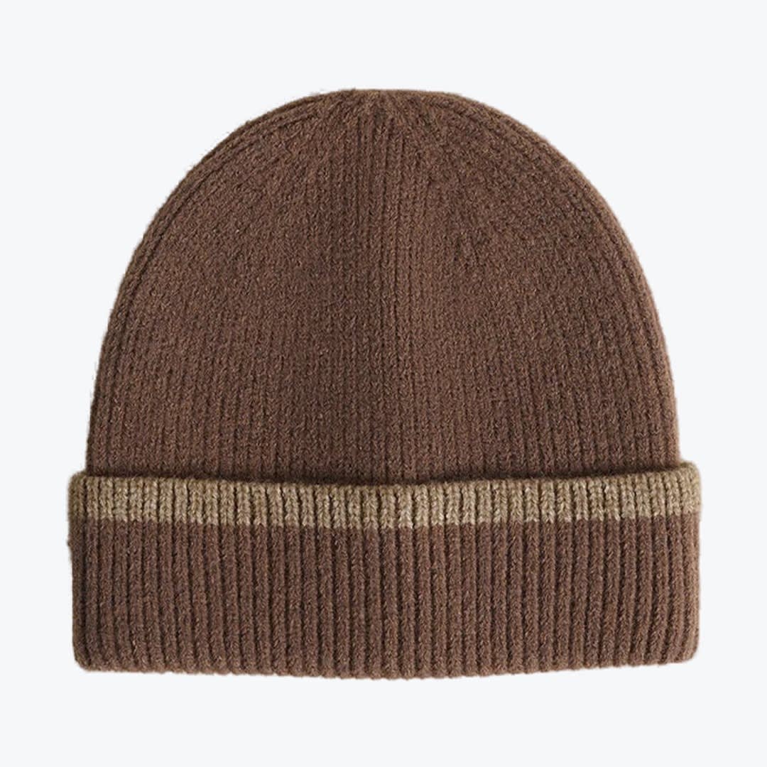 Two-Tone Brown Ribbed Knit Beanie A brown ribbed knit beanie hat with a folded cuff and a thin tan stripe, isolated on a white background.