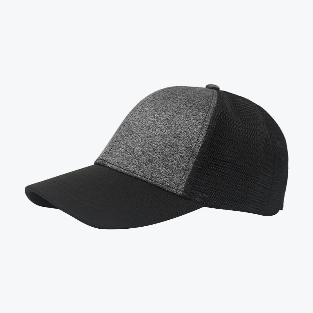 Two-Tone Grey and Black Mesh Trucker Cap A side profile view of a grey and black trucker cap with a heather grey front, black brim, and black mesh back.