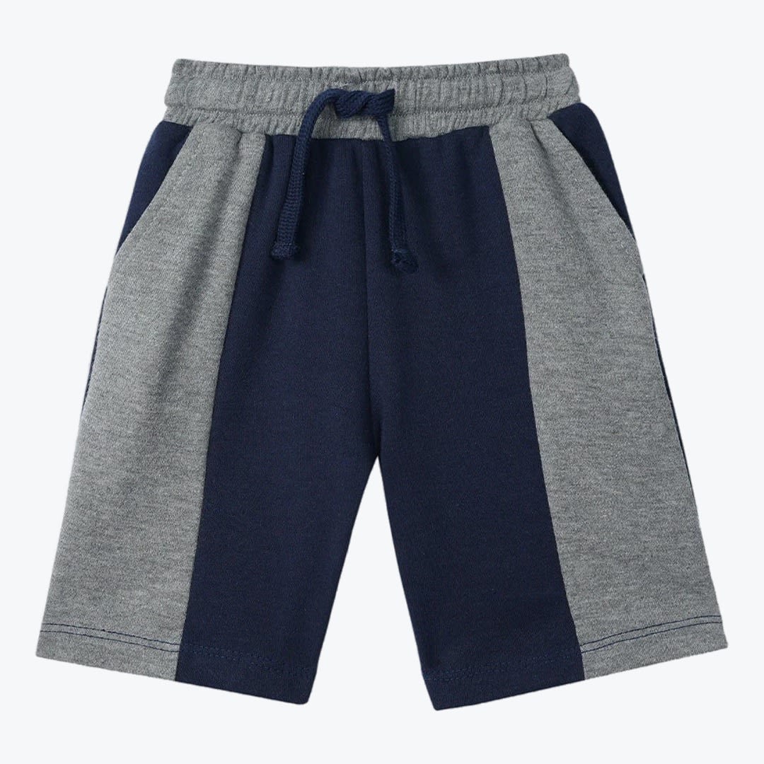 Two-Tone Navy and Gray Kids Sweat Shorts A pair of kids sweat shorts with a navy blue center panel, heather gray side panels, and a gray elastic waistband with a navy drawstring.