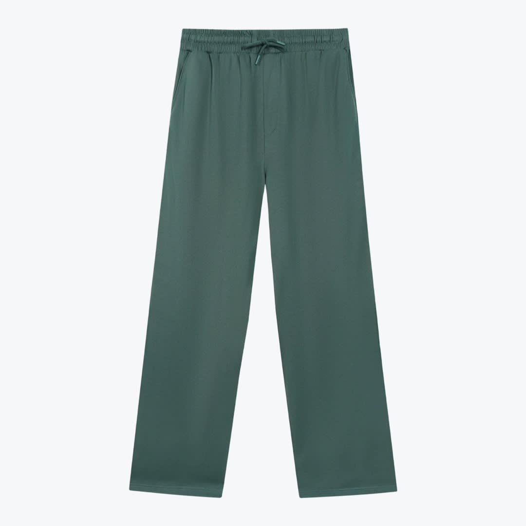 Casual Dark Green Drawstring Pants A pair of dark green wide-leg trousers with an elastic drawstring waistband laid flat against a white background.
