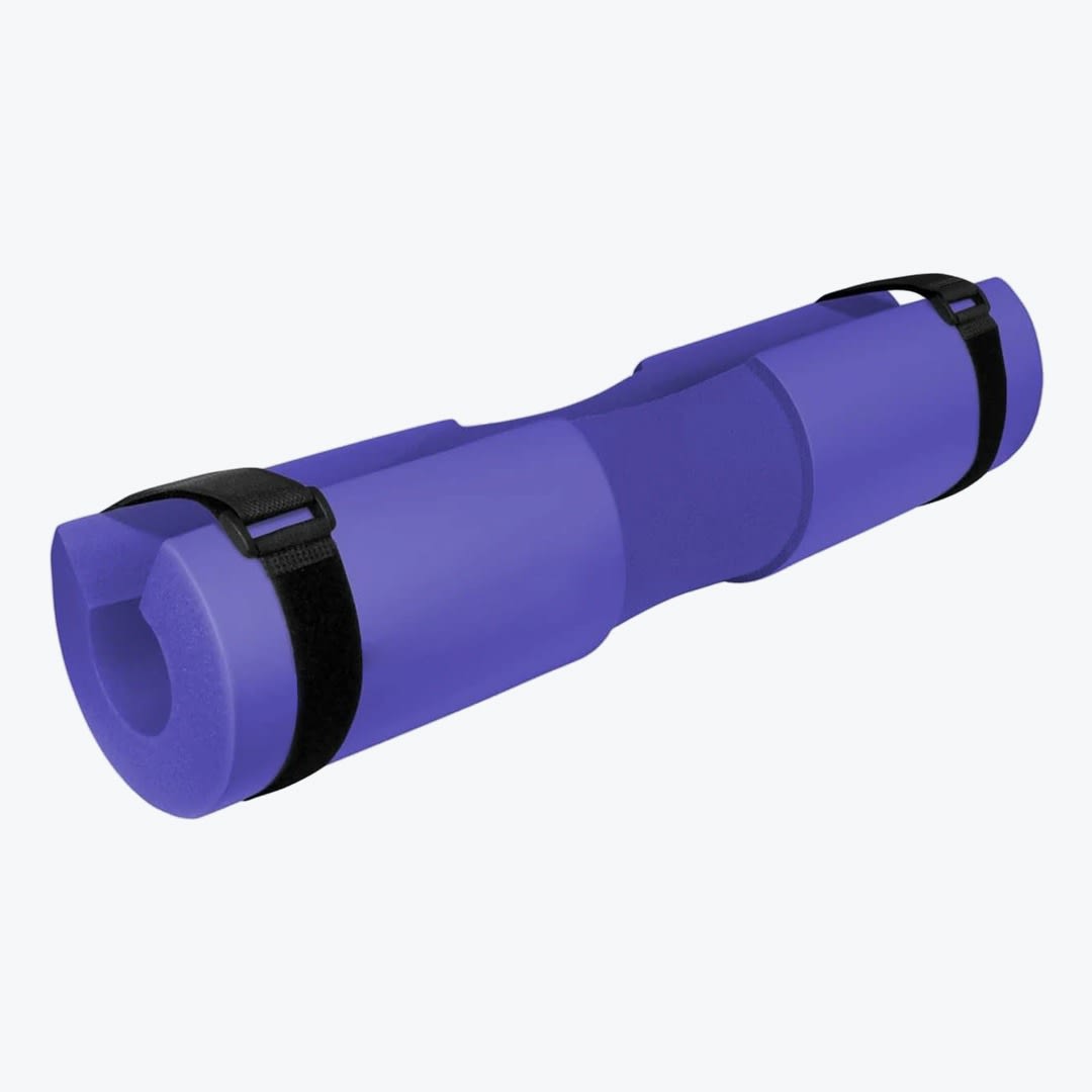 A purple foam barbell pad with an ergonomic neck groove, secured by two black velcro straps, isolated on a white background.