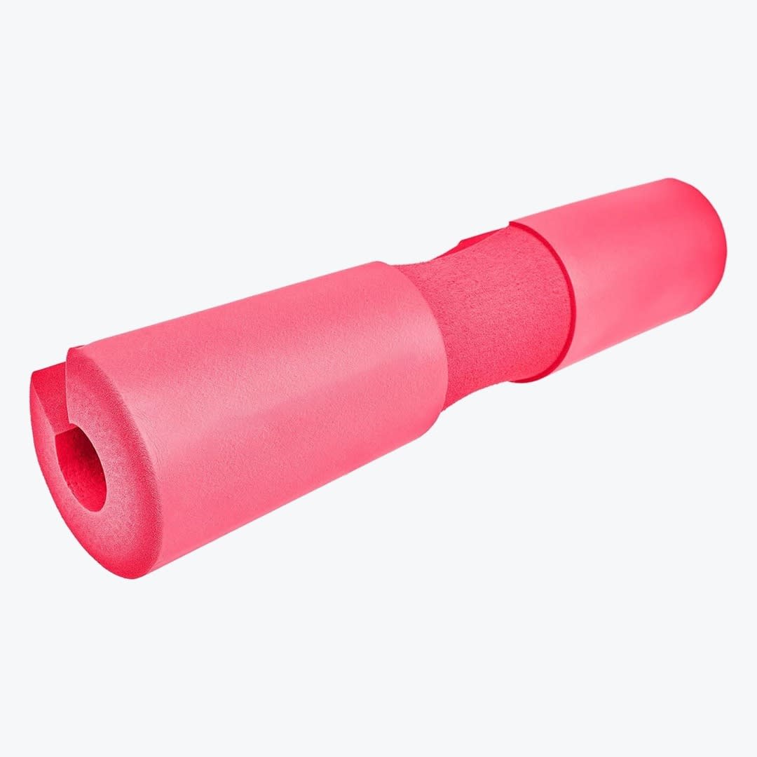 Pink Barbell Squat Pad A bright pink foam barbell pad with an ergonomic neck groove, isolated on a white background.