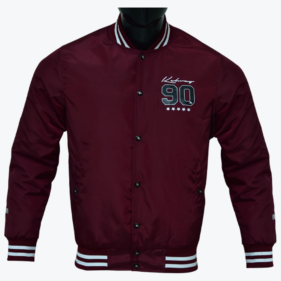 Maroon Varsity Bomber Jacket with 90 Graphic A maroon varsity bomber jacket with white striped ribbing on the collar, cuffs, and hem, featuring 90 graphic on the left chest, displayed on a black mannequin against a white background.