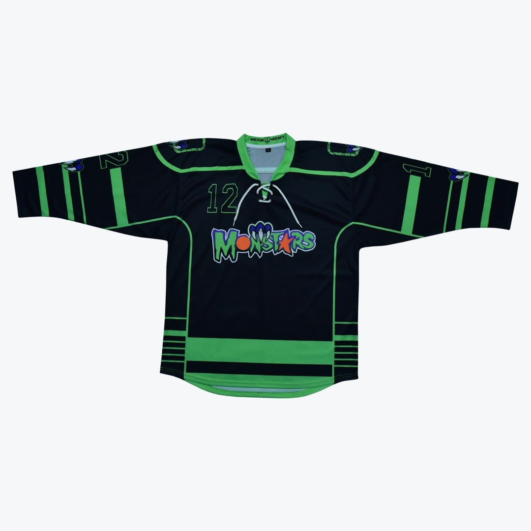 Monstars Ice Hockey Jersey A black ice hockey jersey with bright green accents, featuring the stylized word Monstars and the number 12 on the front.