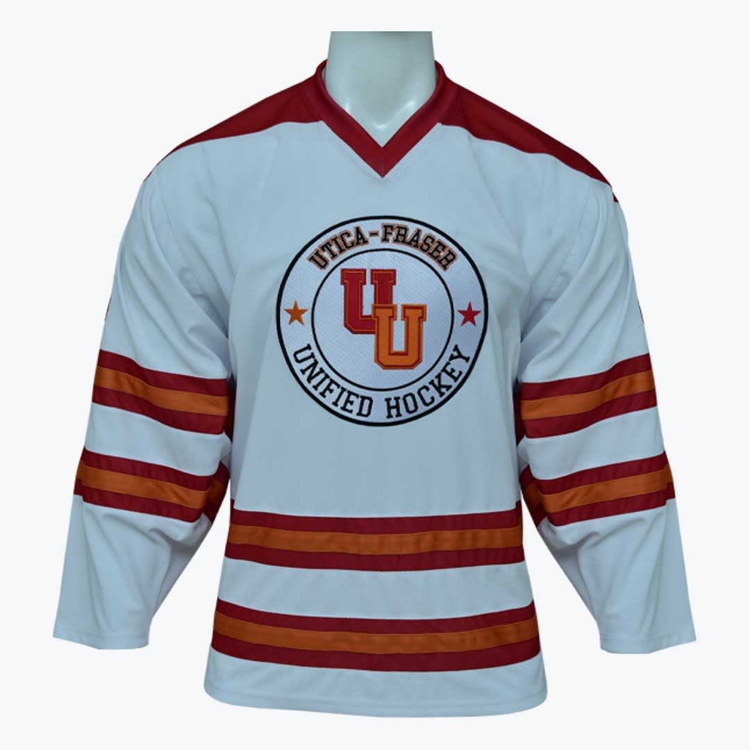 Utica-Fraser Unified Hockey Jersey A white hockey jersey with red and orange stripes and a circular logo that reads Utica-Fraser Unified Hockey on the front.
