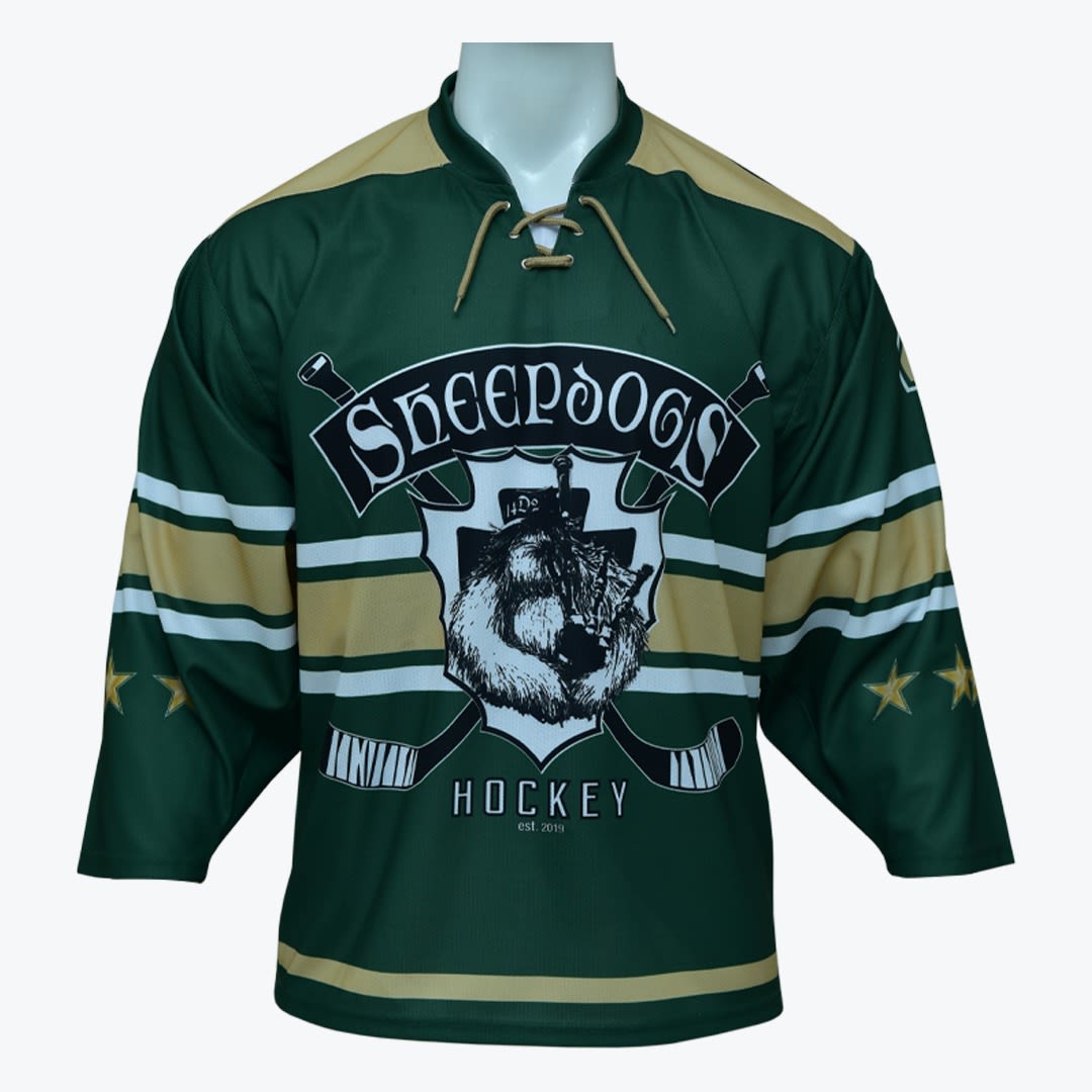 Sheepdogs Hockey Jersey A forest green hockey jersey with gold and white stripes, featuring a Sheepdogs Hockey crest with a sheepdog and crossed hockey sticks on a mannequin.
