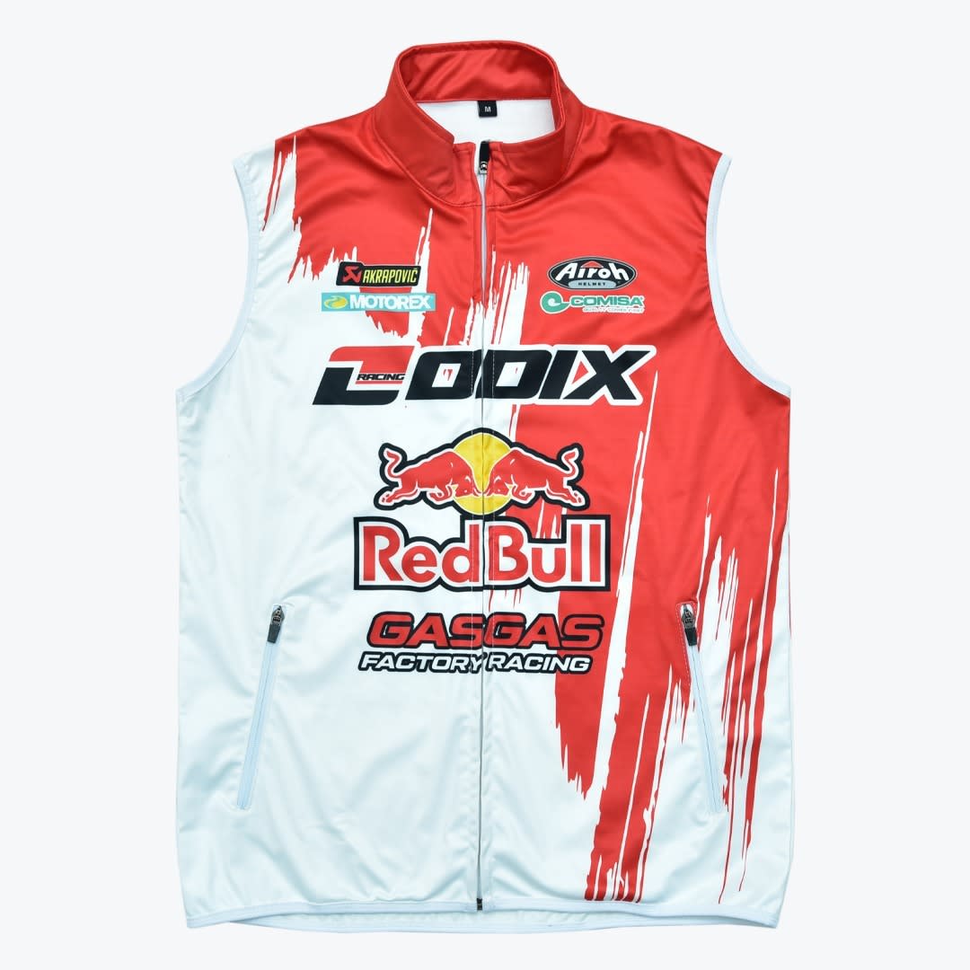 Red Bull GasGas Factory Racing Lodix Vest A red and white sleeveless racing vest with Red Bull, GasGas, and Lodix logos, featuring a full zipper and side pockets.