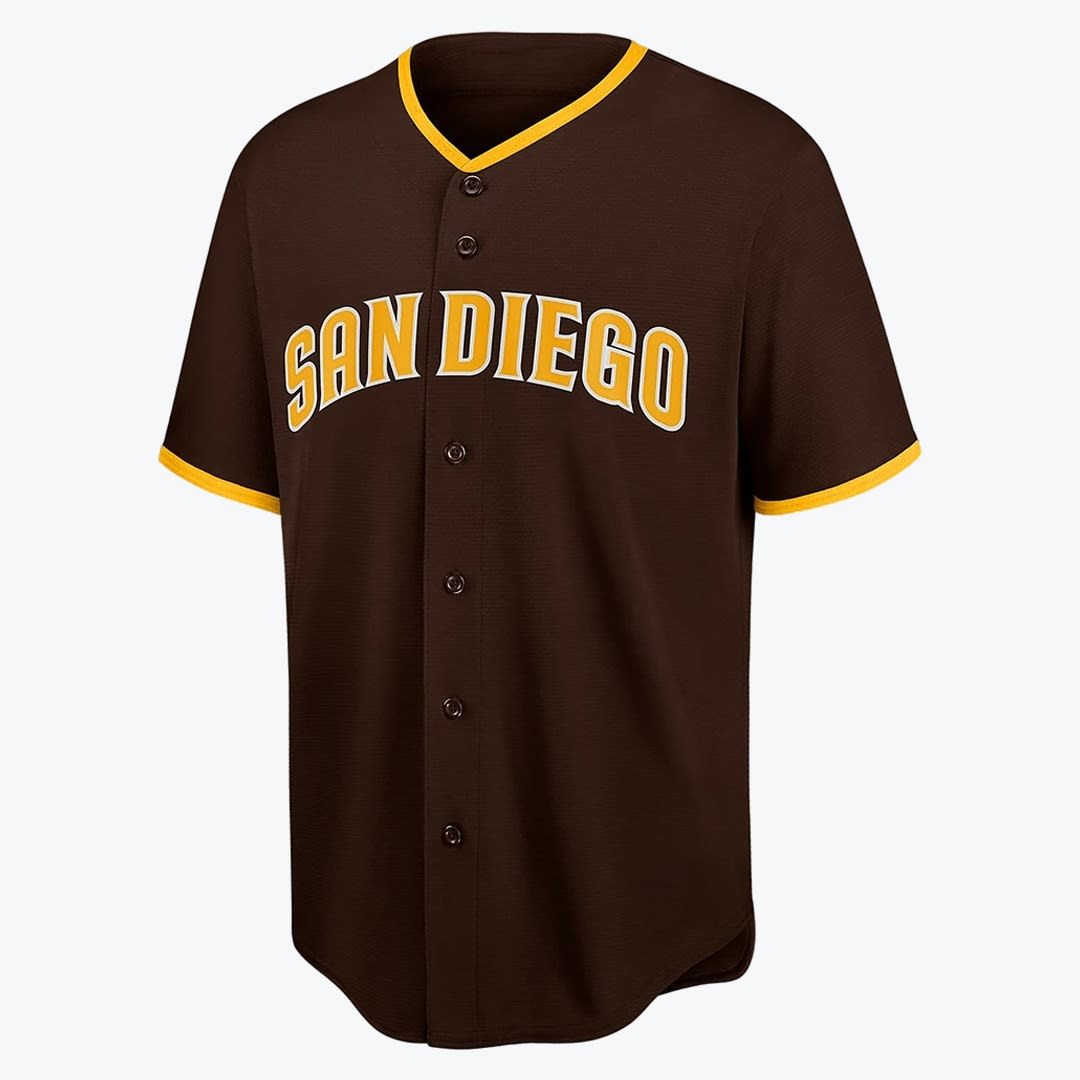 San Diego Padres Brown Baseball Jersey A dark brown San Diego Padres baseball jersey with yellow trim and SAN DIEGO written across the chest in yellow and white letters.