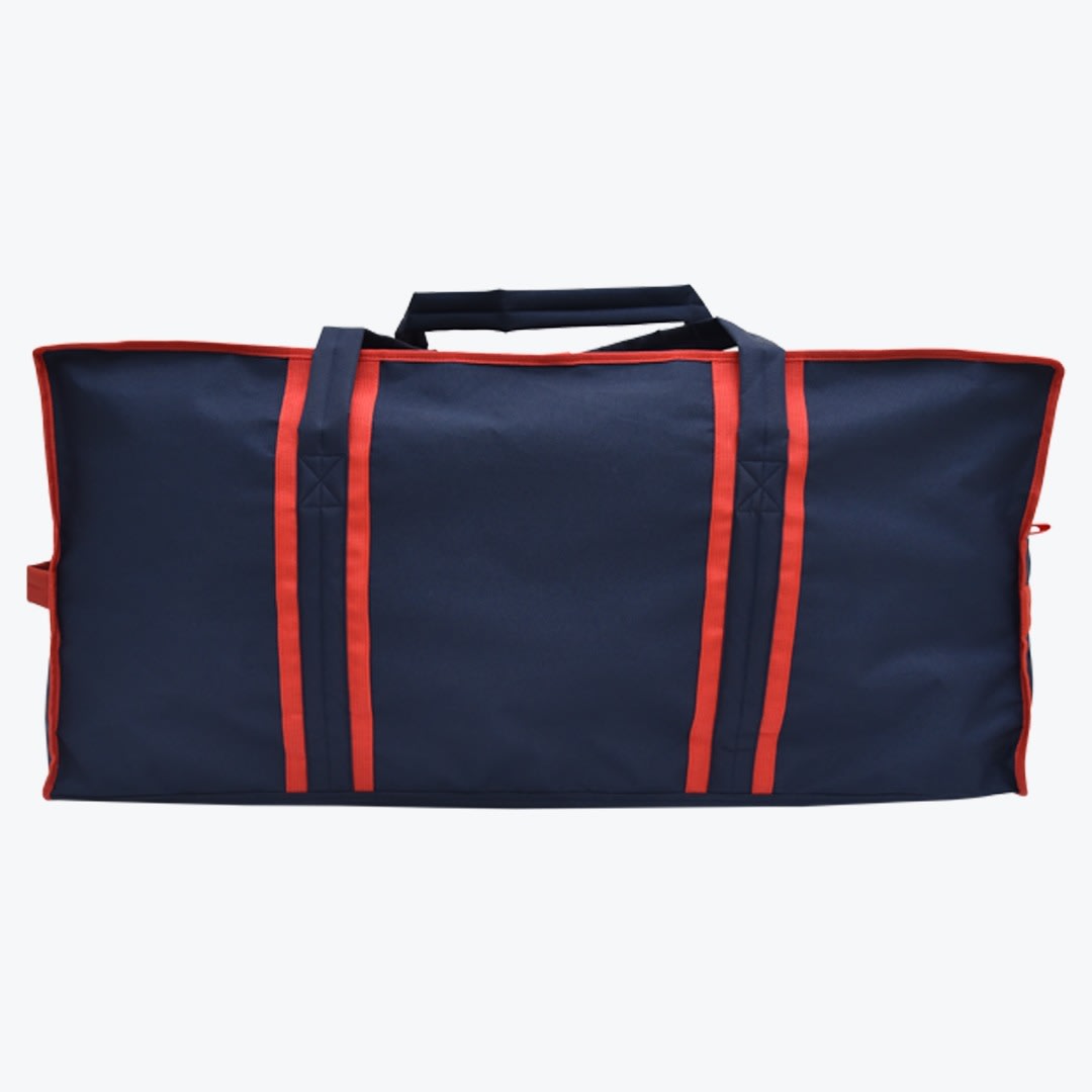 Navy Blue and Red Sports Equipment Bag A rectangular navy blue storage bag with red trim and vertical red accent stripes, featuring a central carrying handle.