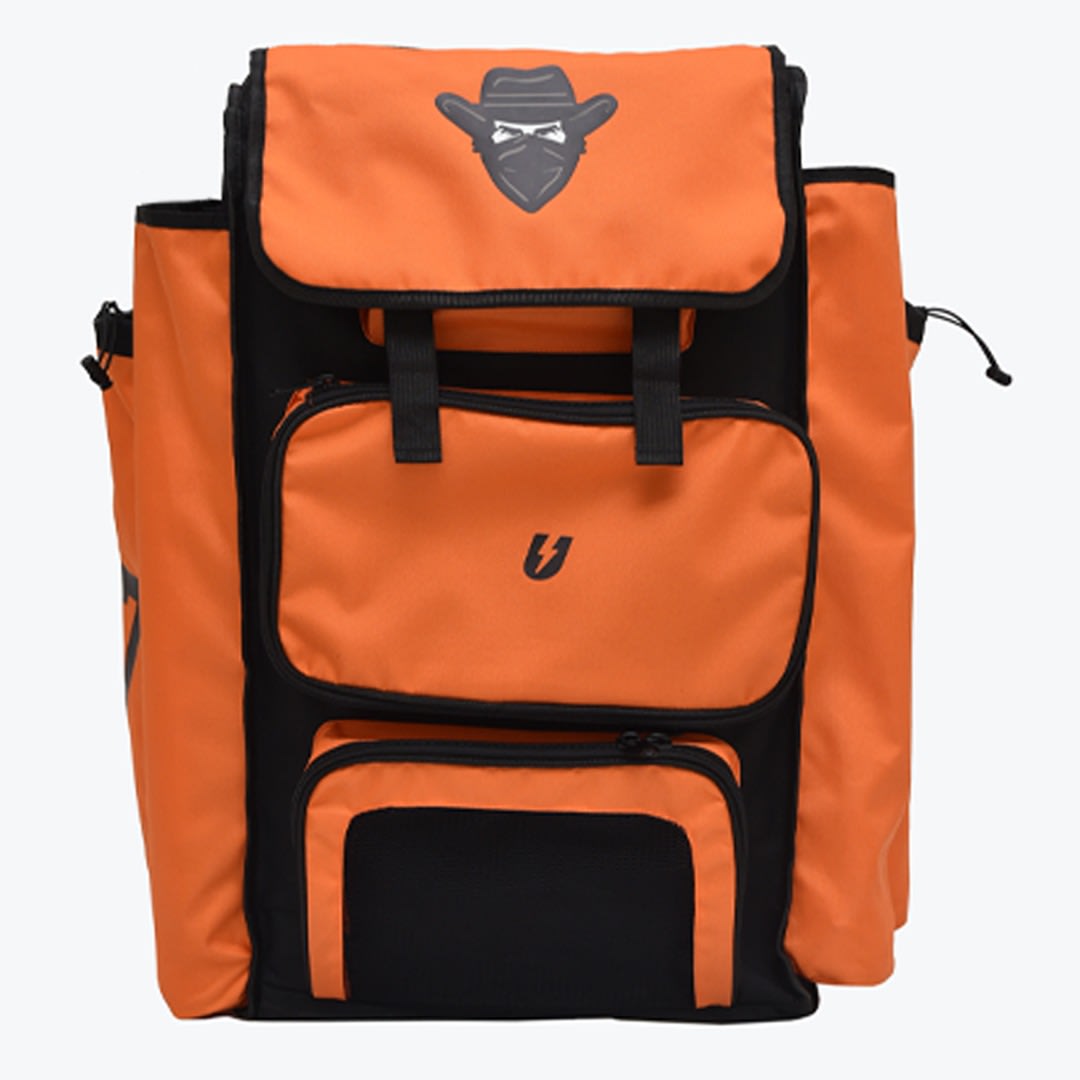 A front view of an orange and black backpack featuring a cowboy bandit logo on the top flap and a lightning bolt logo on the middle pocket.