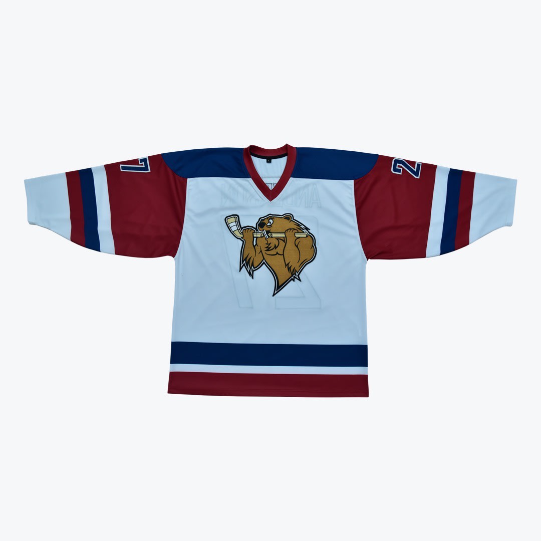 Custom Hockey Jersey with Beaver Logo A white hockey jersey with maroon sleeves, navy blue shoulders, and a cartoon beaver logo holding a hockey stick on the front.