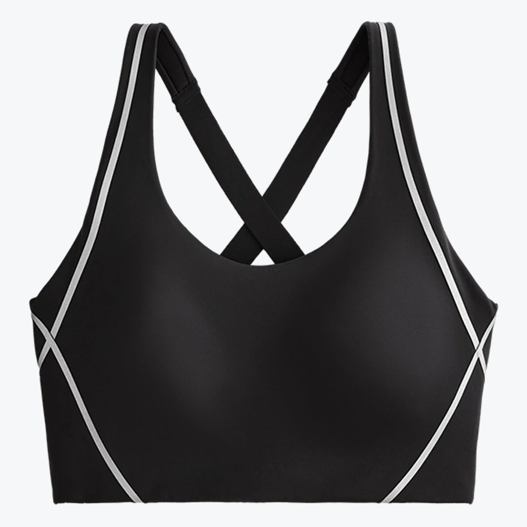 Black Sports Bra with White Piping A black sports bra with white piping accents and criss-cross back straps, shown against a plain white background.