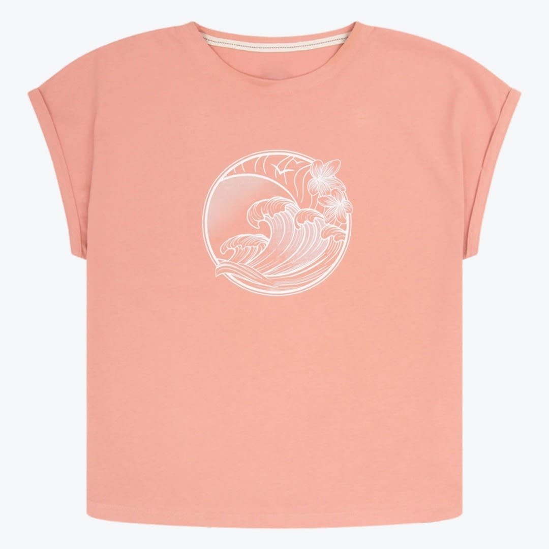 Peach Wave and Flower Graphic T-Shirt A peach-colored short-sleeve t-shirt with a white circular graphic of ocean waves and tropical flowers on the chest.