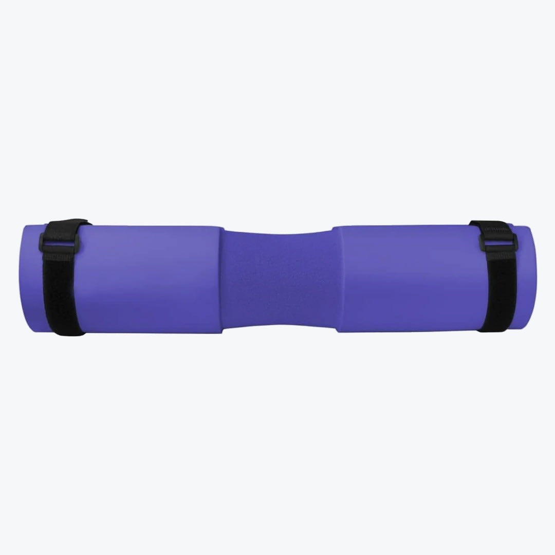 A purple foam barbell pad with an ergonomic neck groove and two black securing straps, isolated on a white background.