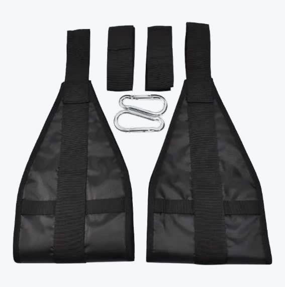 A set of black hanging ab straps with two padded arm slings, two extension straps, and two silver carabiners on a white background.