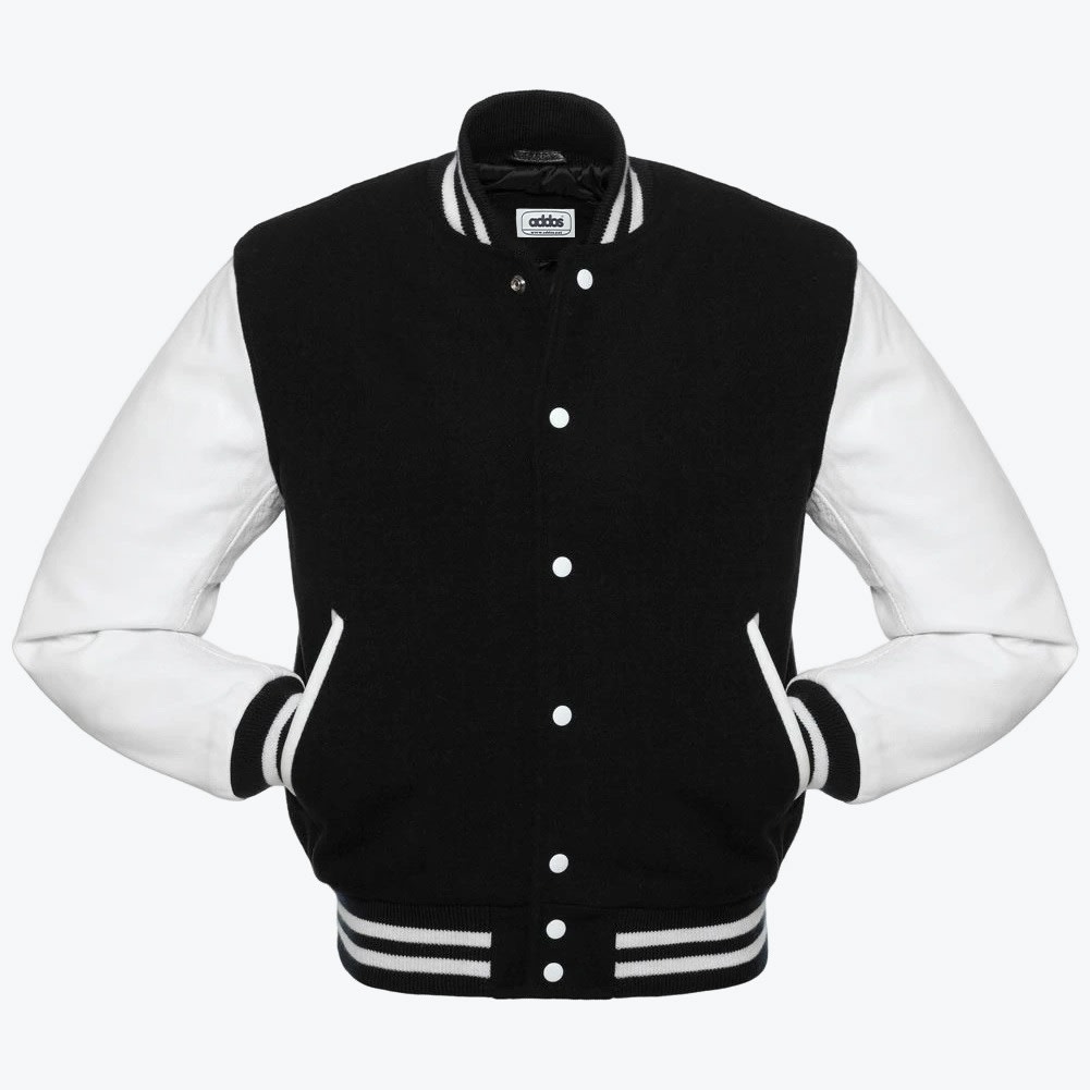 A front view of a classic black and white varsity jacket with white sleeves, white snap buttons, and striped ribbed detailing on the collar, cuffs, and hem.
