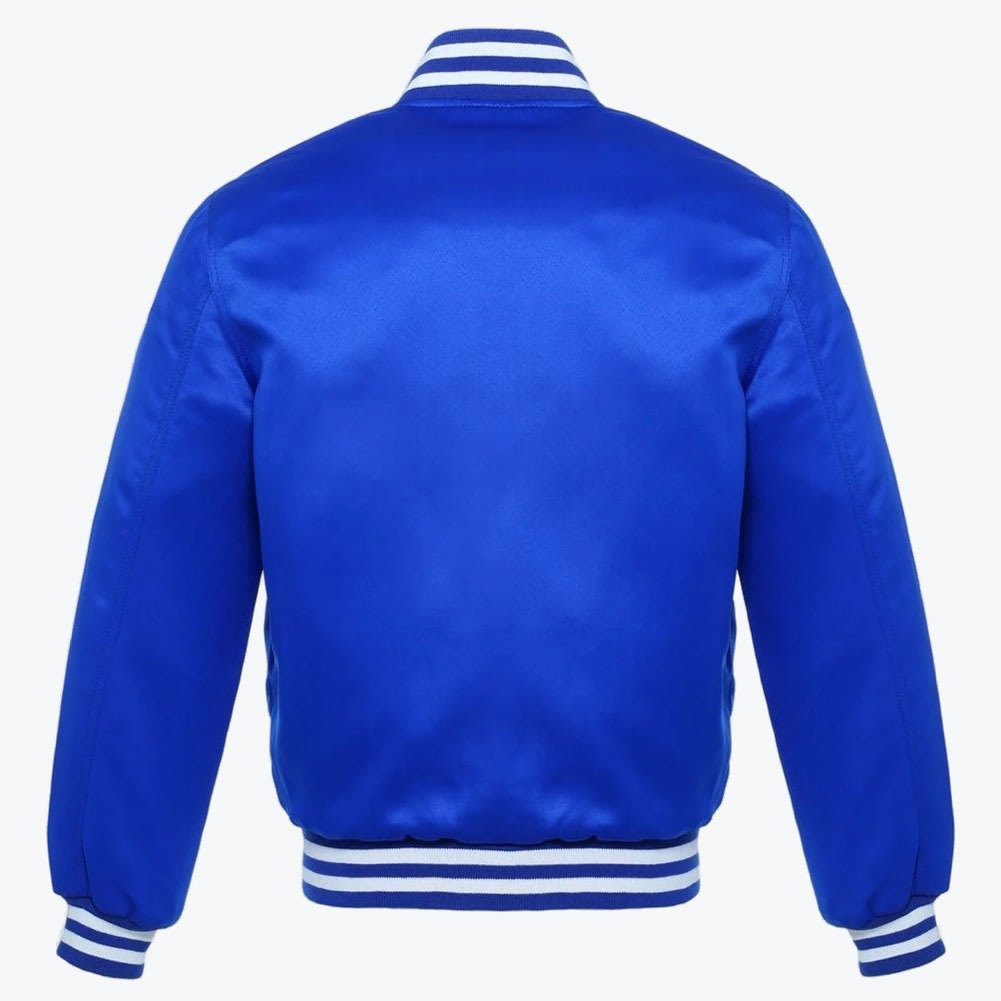 Back view of a royal blue satin varsity jacket with blue and white striped ribbed trim on a white background.