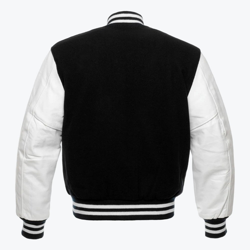 Back view of a black and white varsity jacket with a black body, white sleeves, and striped ribbed trim against a plain white background.