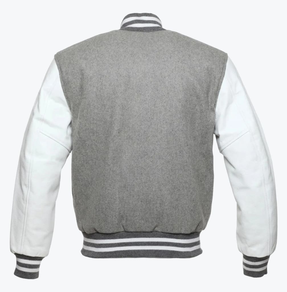 The back view of a grey wool varsity jacket with white leather sleeves and striped ribbed trim.
