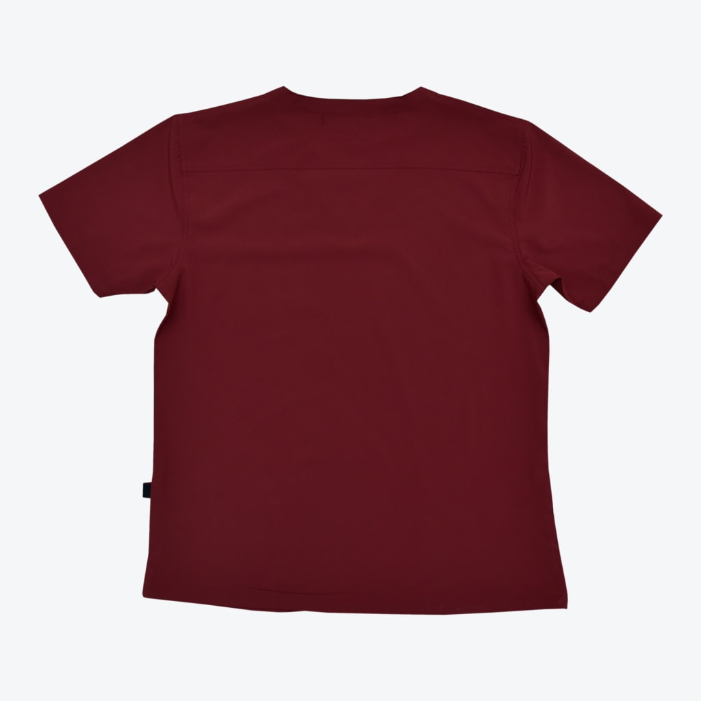 The back view of a solid maroon short-sleeved scrub top with a horizontal yoke seam across the upper back, displayed flat on a white background.