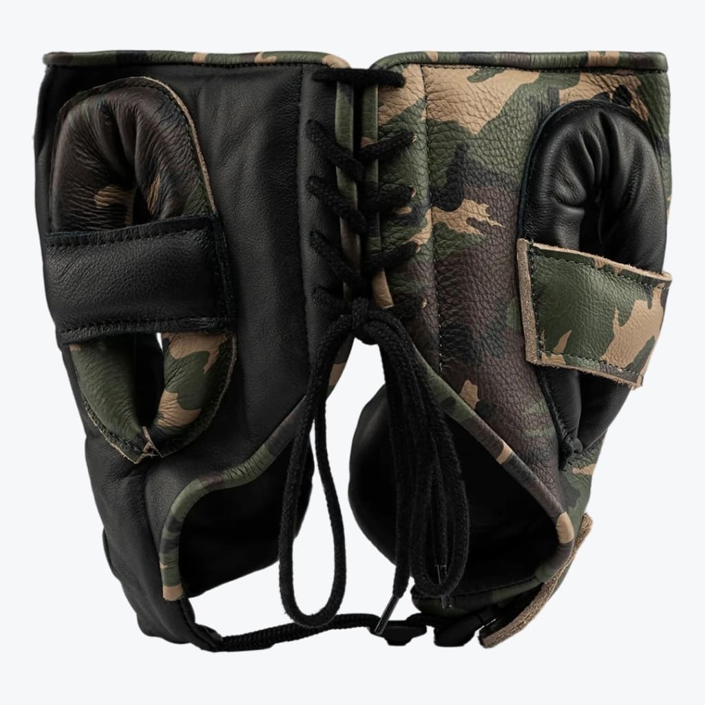 Rear view of a boxing headguard featuring a split design of black leather and camouflage pattern, secured with black laces at the back.