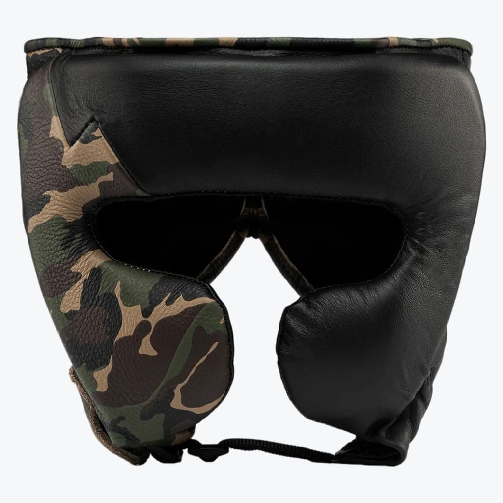 A front view of a padded boxing head guard with a split design: one half is green and brown camouflage leather, and the other half is solid black leather, set against a plain white background.