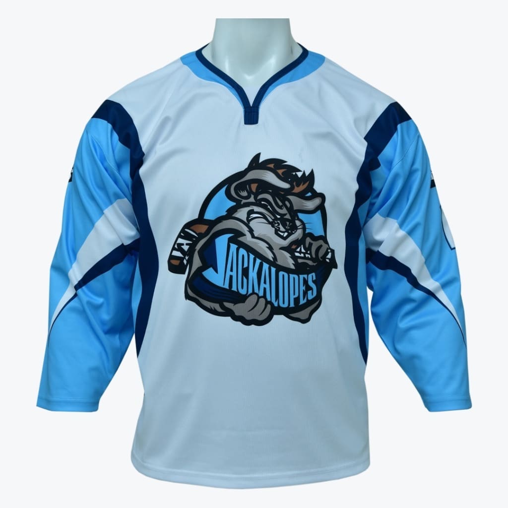 A light blue and white hockey jersey with a cartoon jackalope logo on the front, displayed on a mannequin.