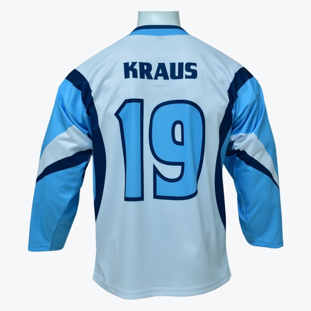 The back of a light blue hockey jersey with the name KRAUS and number 19 in dark blue, displayed on a mannequin against a white background.