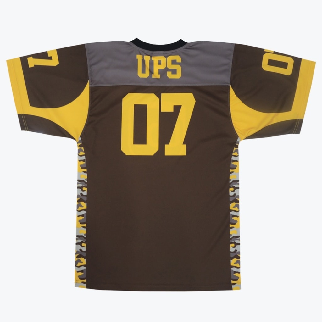 The back view of a brown and yellow football jersey with UPS and the number 07 in yellow.