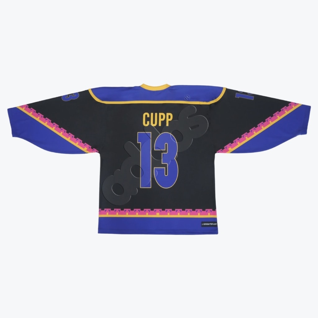 Back view of a black, blue, and yellow hockey jersey with CUPP and the number 13 printed on the back.
