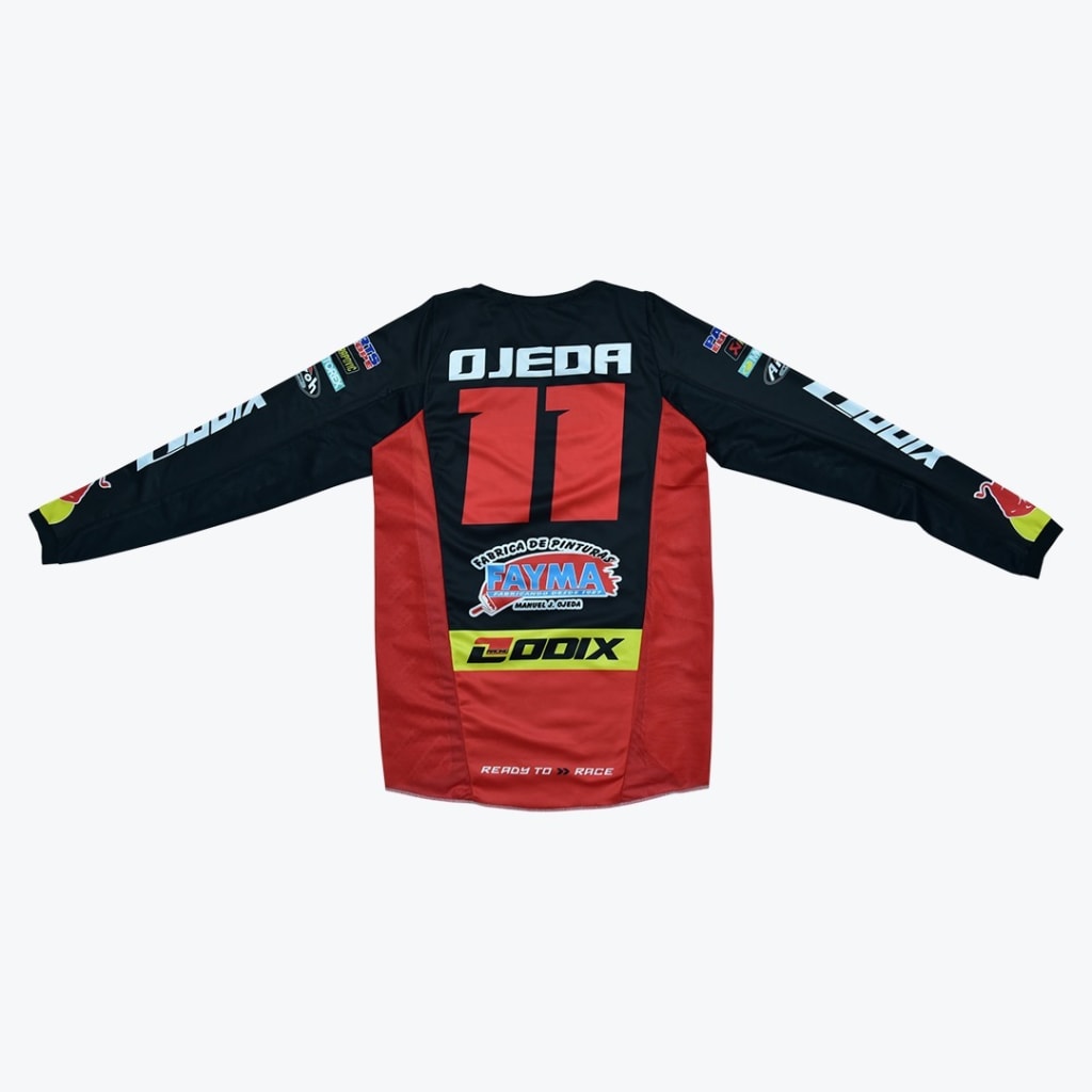 Back view of a black and red custom motocross jersey with OJEDA 11 and sponsor logos printed on it.