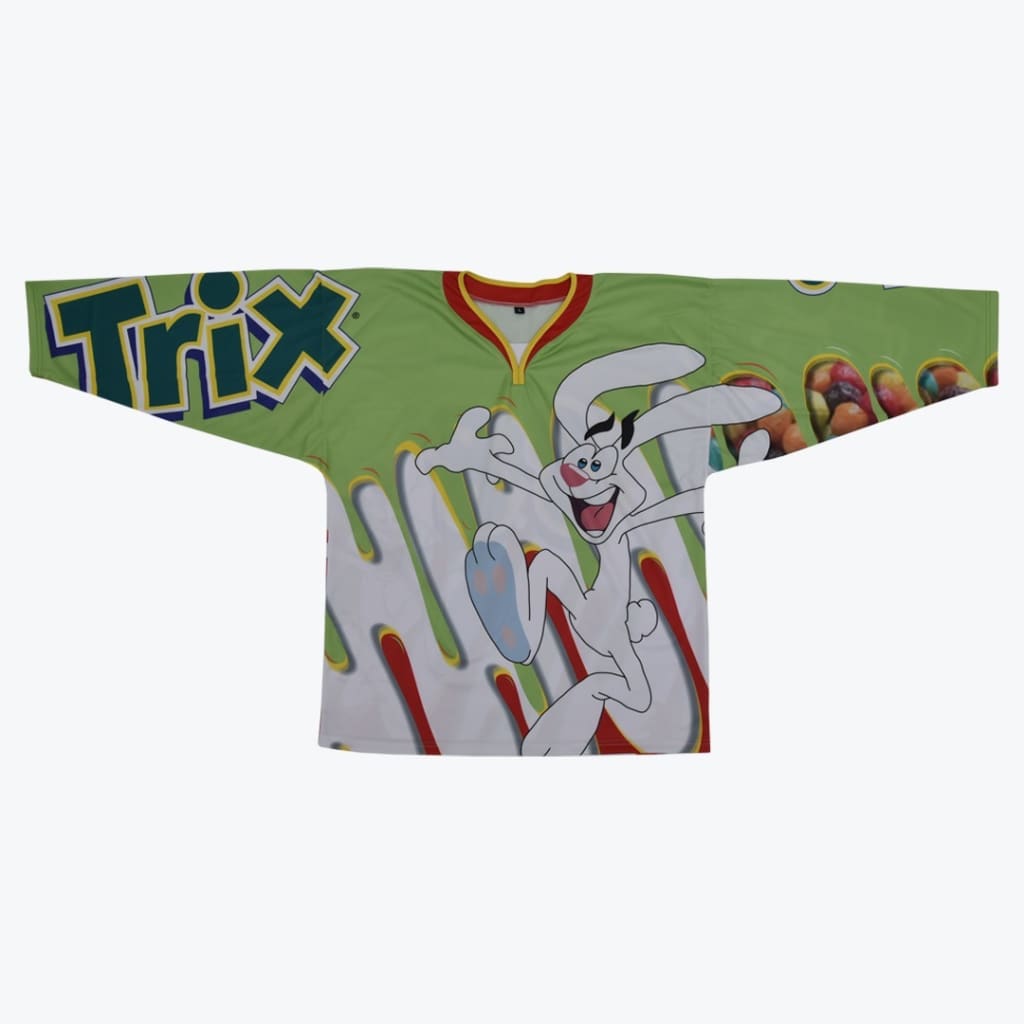 A lime green long-sleeve jersey featuring the Trix Rabbit character on the front and the Trix logo on the left sleeve.