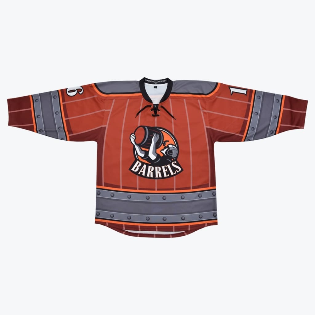 A custom reddish-brown hockey jersey designed to look like a wooden barrel, featuring a central Barrels logo, vertical stave lines, and grey riveted hoop bands on the hem and sleeves.