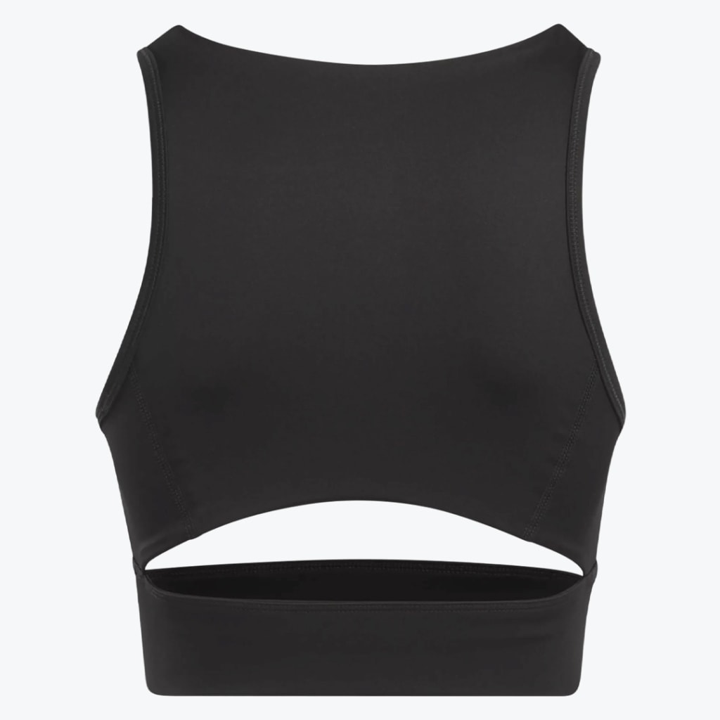 Front view of a black sleeveless crop top with a high neck and a horizontal cutout above the hem, set against a plain white background.