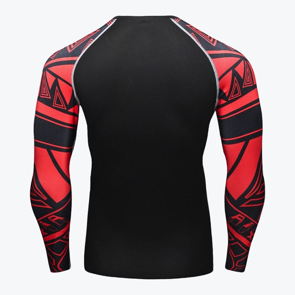 Back view of a black long-sleeved compression shirt with red and black geometric tribal patterns on the sleeves, set against a plain white background.