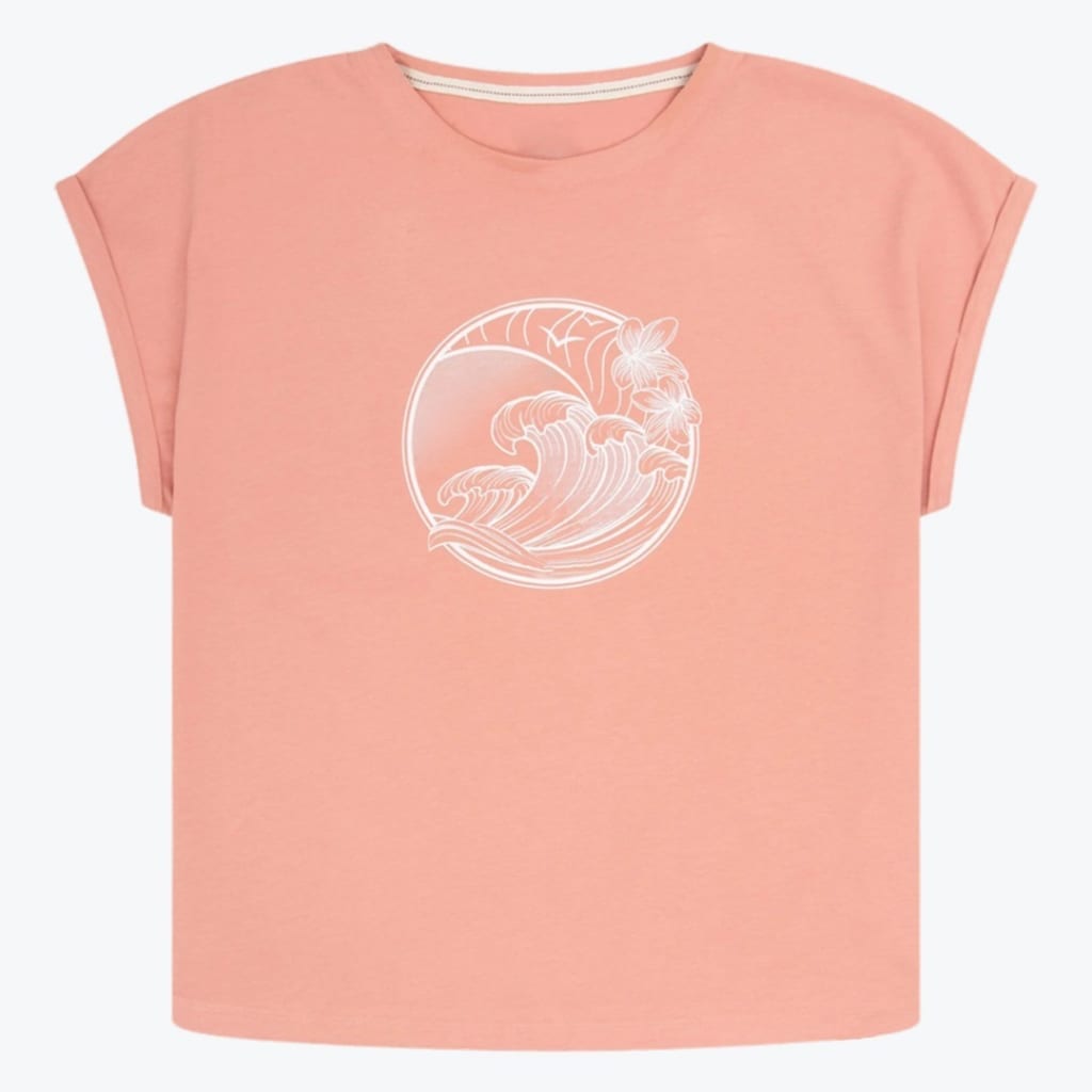 A peach-colored short-sleeve t-shirt with a white circular graphic of ocean waves and tropical flowers on the chest.