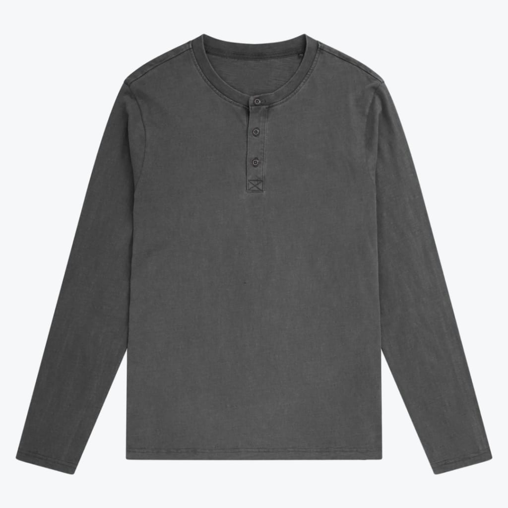 A flat lay photo of a charcoal grey long-sleeve henley shirt with a three-button placket on a white background.