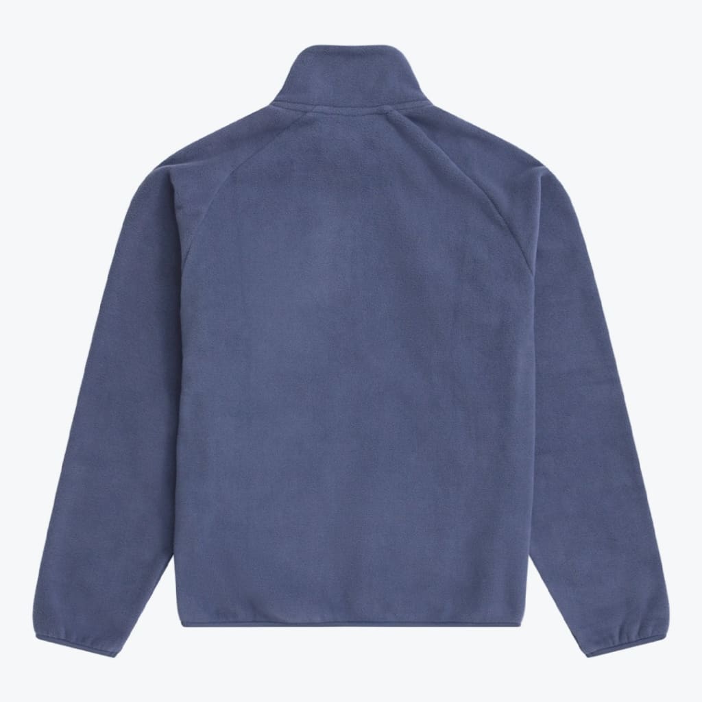 The back view of a slate blue fleece jacket with raglan sleeves and a high collar, laid flat on a white background.