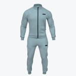 A light grey men tracksuit set including a full-zip jacket and matching jogger pants with black side stripes, shown on a white background.