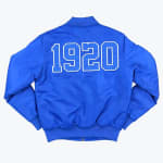 The back of a bright blue bomber jacket featuring the number 1920 in large white-outlined block letters against a solid white background.