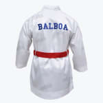 The back of a white satin boxing robe with printed in blue block letters and a red belt around the waist.