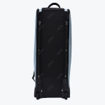 Back view of a tall black and light blue Addos wheeled sports bag standing vertically on a white background.