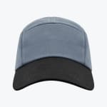 A front-facing view of a two-tone baseball cap with a grey crown and a black curved brim against a white background.