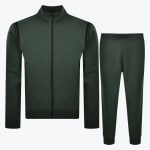 A two-piece dark green mens tracksuit consisting of a zip-up jacket with black shoulder stripes and matching drawstring jogger pants, displayed against a white background.