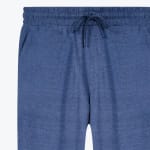 Close-up of the elastic waistband and tied drawstring of blue heathered lounge pants.