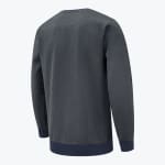 Back view of a charcoal grey crewneck sweatshirt with navy blue ribbed cuffs and hem against a white background.