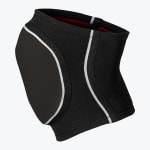 A black athletic knee sleeve with a textured front pad and white piping, shown from a side angle on a white background.