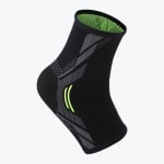 A black ankle compression sleeve with grey textured patterns and neon green accents, isolated on a white background.