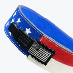 Close-up of a patriotic American flag themed lever weightlifting belt with a black metal buckle featuring an engraved US flag.